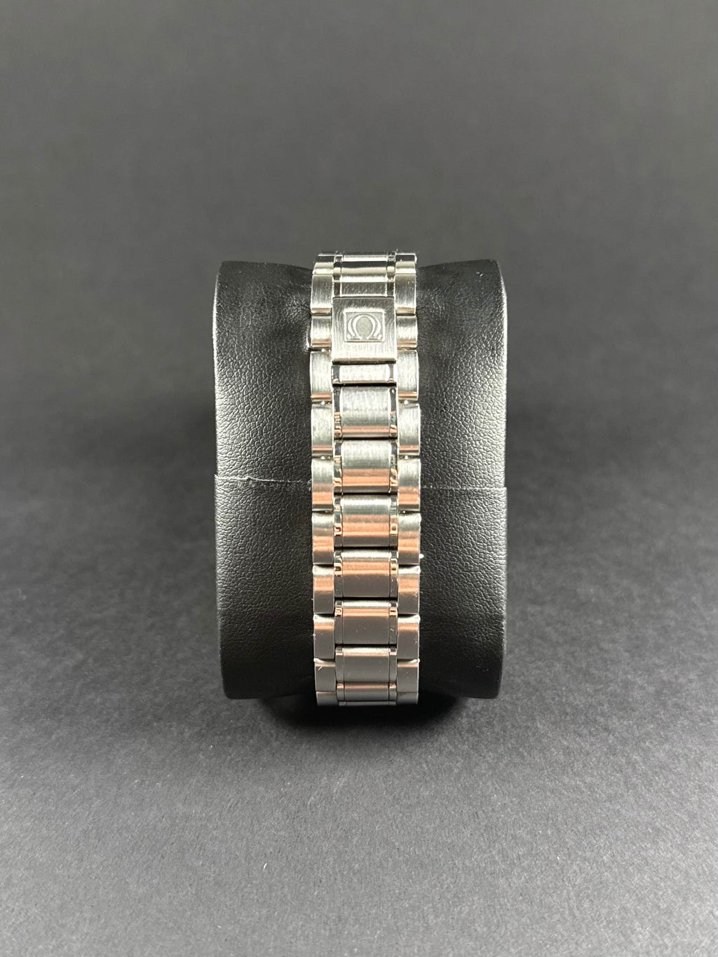 Omega Speedmaster Reduced 3515.53.00 vista trasera, tapa sólida de acero inoxidable